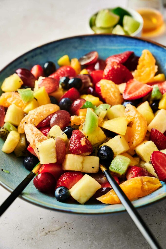 A vibrant bowl brimming with a delectable fruit salad.