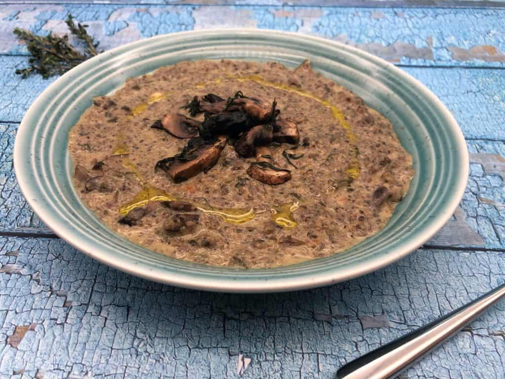 A bowl of hot tasty mushroom soup waiting to be eaten