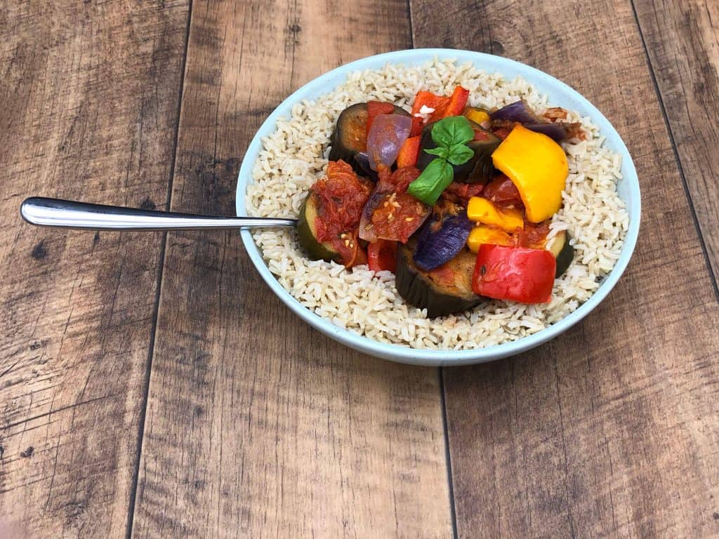 Delicious bowl of homemade ratatouille with a fork