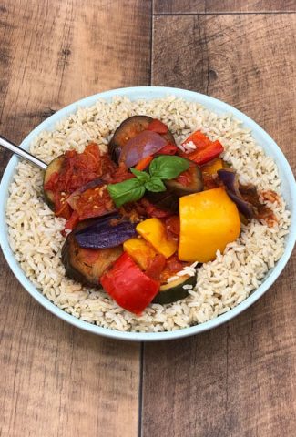 Vegan tasty ratatouille on a bed of brown rice