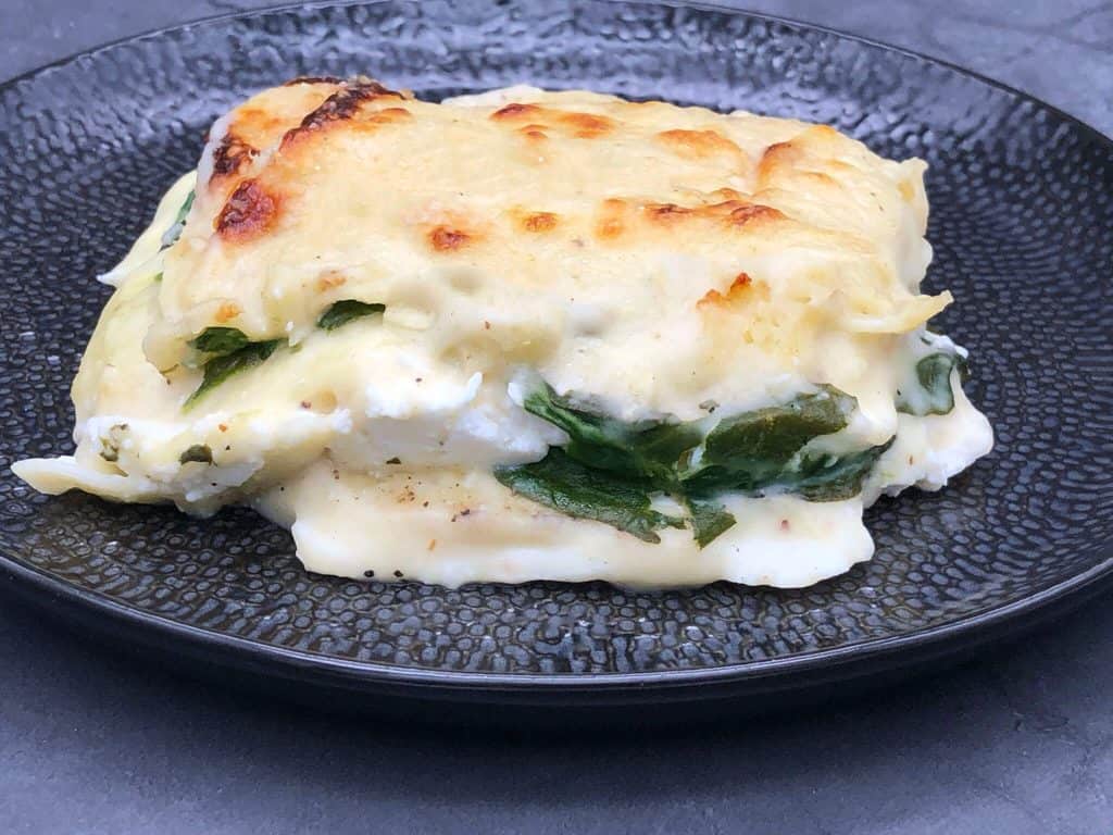 A portion of tasty four cheese lasagne