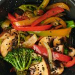 A delicious and nutritious stir fry made with fresh vegetables cooked to perfection in a wok.