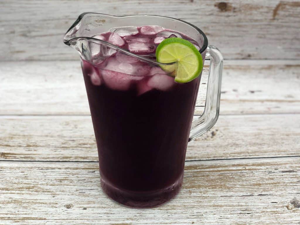 A jug of homemade purple rain cocktail