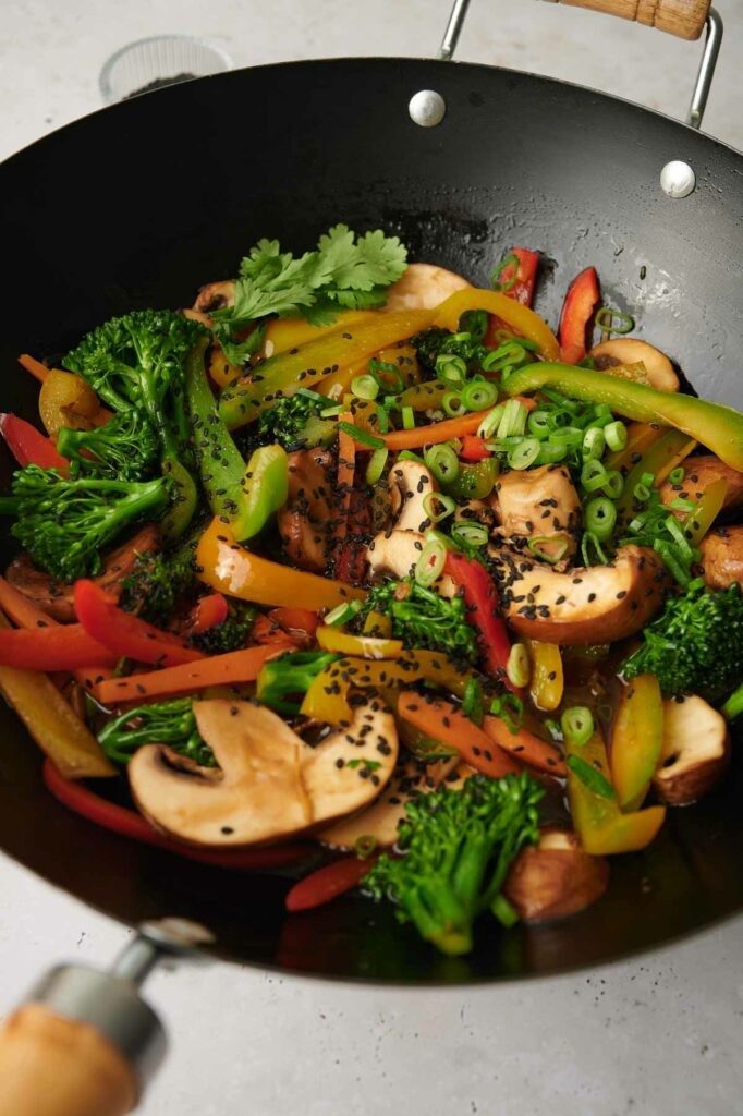 Vegetable stir-fry in a wok.