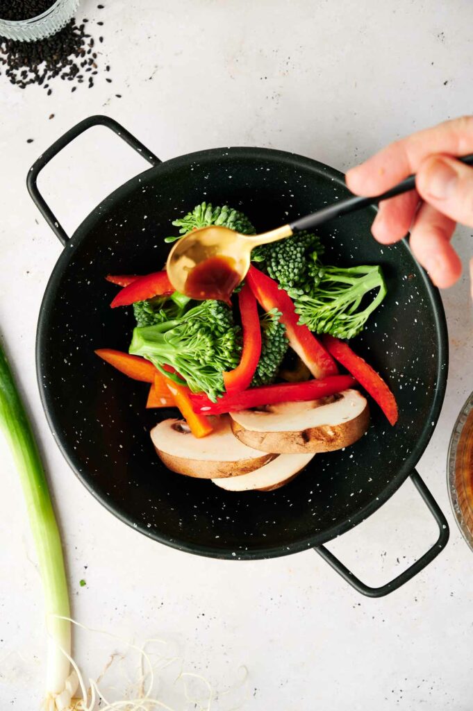 Vegetable stir fry in a wok.