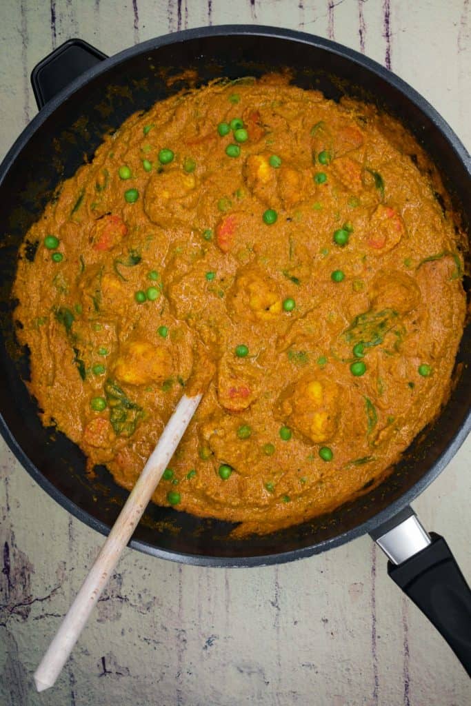 Mixed vegetable curry korma in a wok