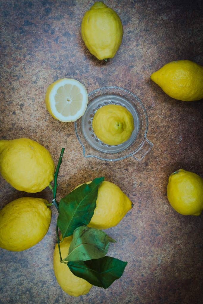 Fresh lemons and lemon juice