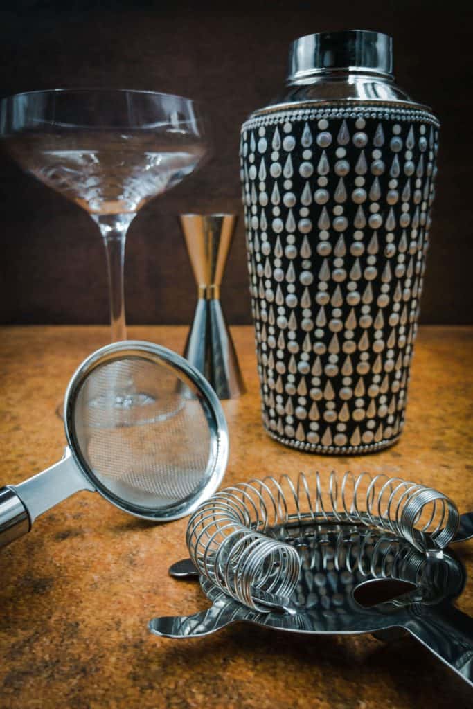 Cocktail shaker, Hawthorne strainer, fine strainer, giggle and cocktail glass