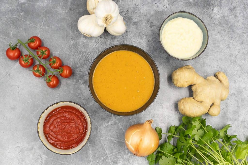 Indian restaurant curry base sauce, garlic and ginger paste, fresh ginger, onion, coriander and tomato paste