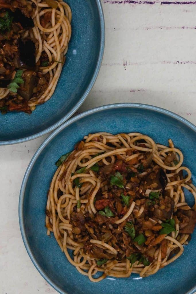 Two bowls of vegan spaghetti bolognese