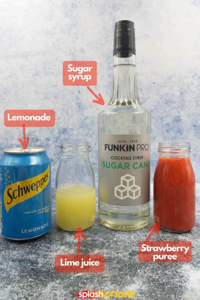 Ingredients needed to make a strawberry daiquiri mocktail drink, lemonade, fresh lime juice, sugar syrup and strawberry puree.