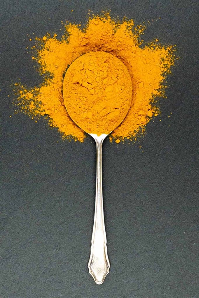 A wonderful yellow spoonful of turmeric spice.