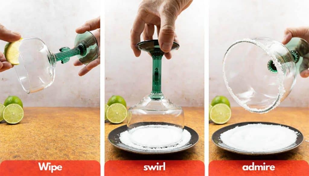 Process shot for making margarita salted rim, wipe with fresh lime juice from wedge, swirl in salt and admire.