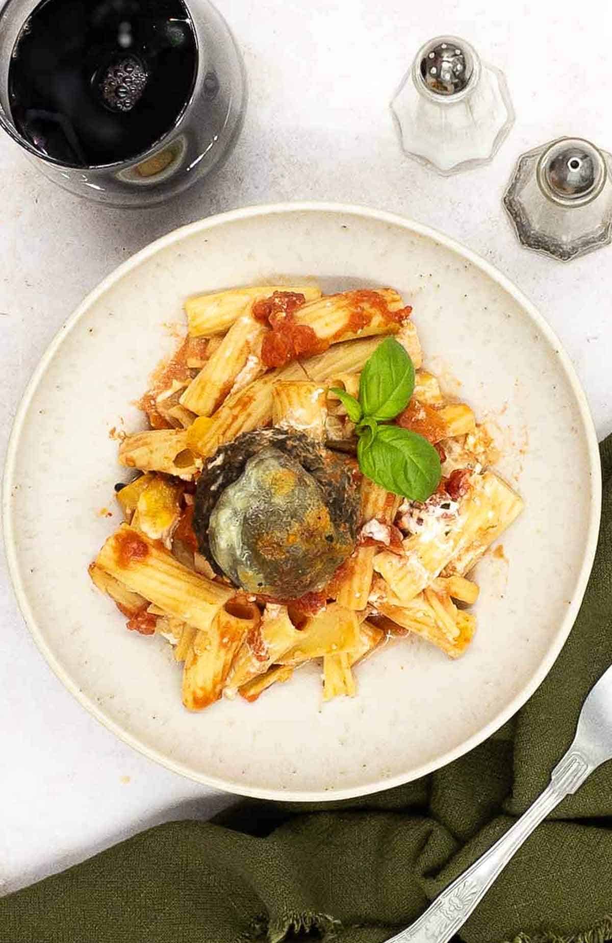 Veggie pasta bake with meatballs and rigatoni pasta.