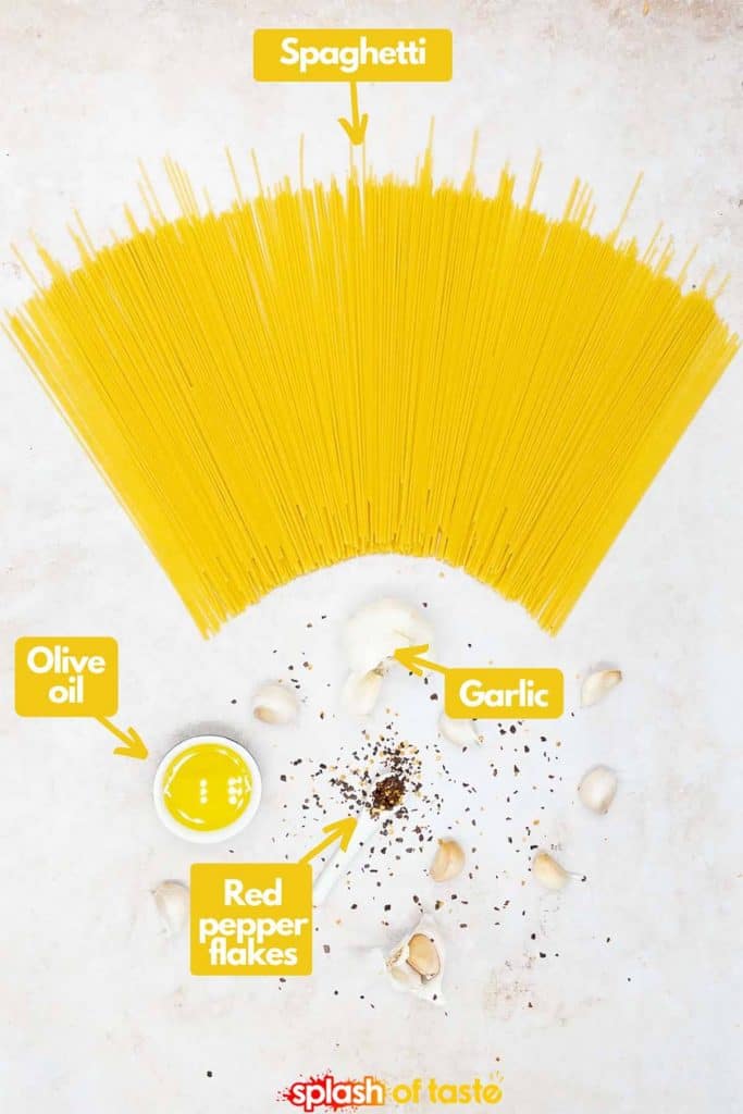 Ingredients for spaghetti aglio e olio, spaghetti, olive oil, garlic and red pepper flakes.