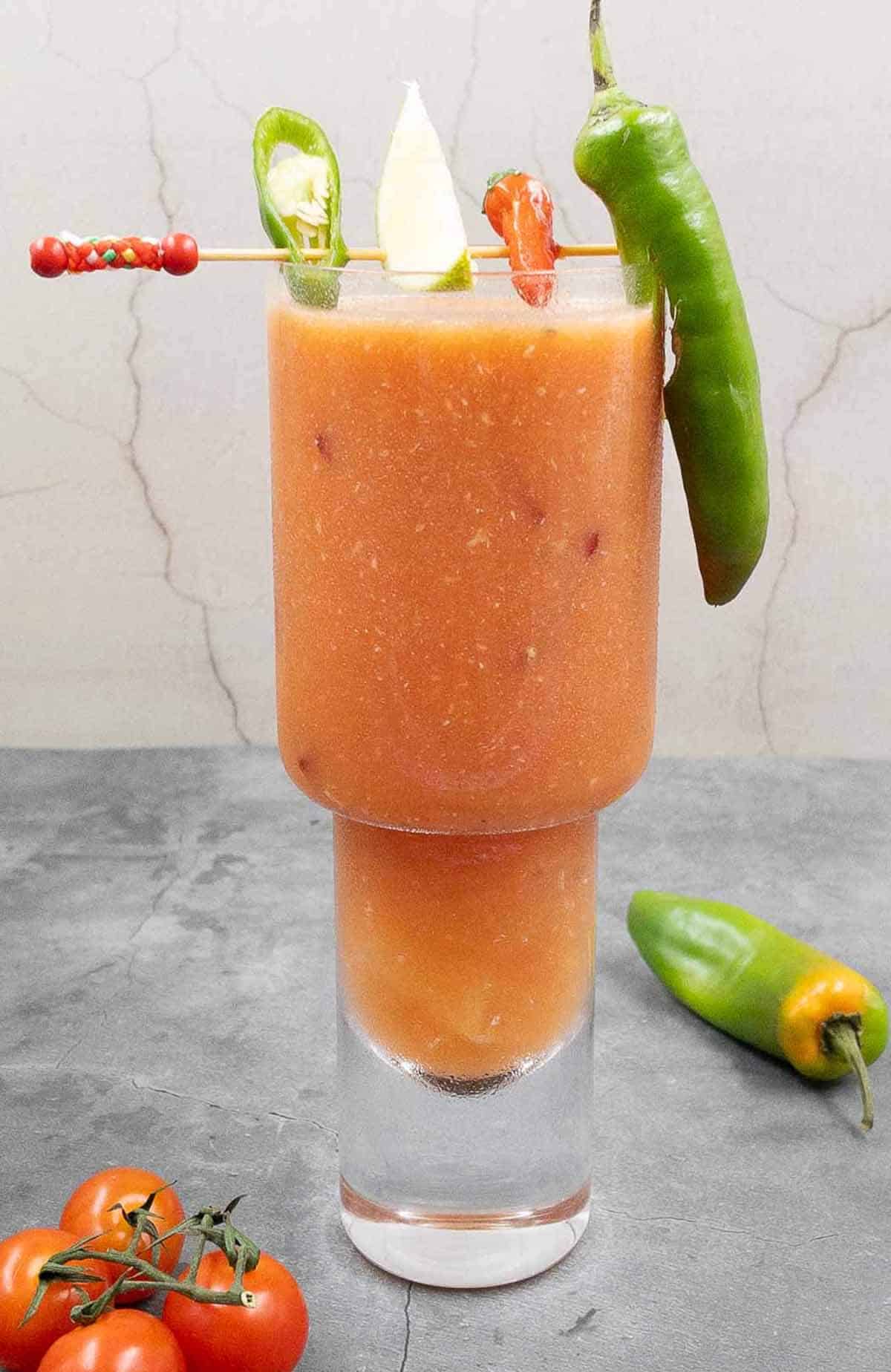 Homemade bloody Maria in a cocktail glass.