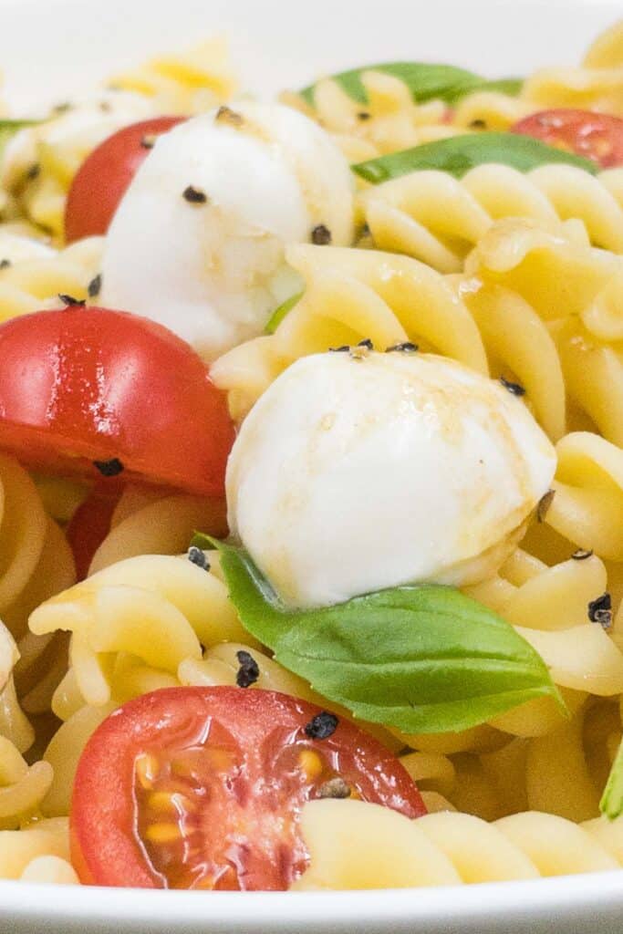 Close up of delicious homemade Caprese pasta salad.