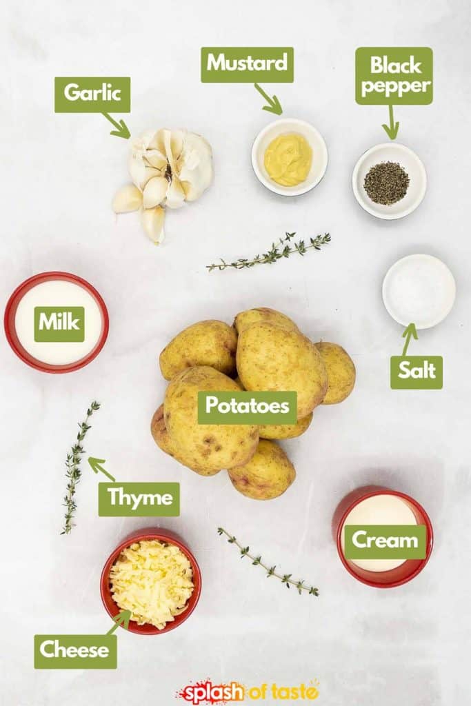 Ingredients to make Potato dauphinoise, garlic, Dijon mustard, salt and pepper, Yukon gold potatoes, milk, fresh thyme, cream and cheese.