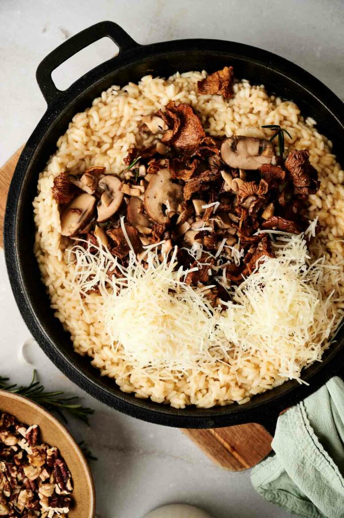 Cooked mushrooms and grated cheese were added on top of the rice.