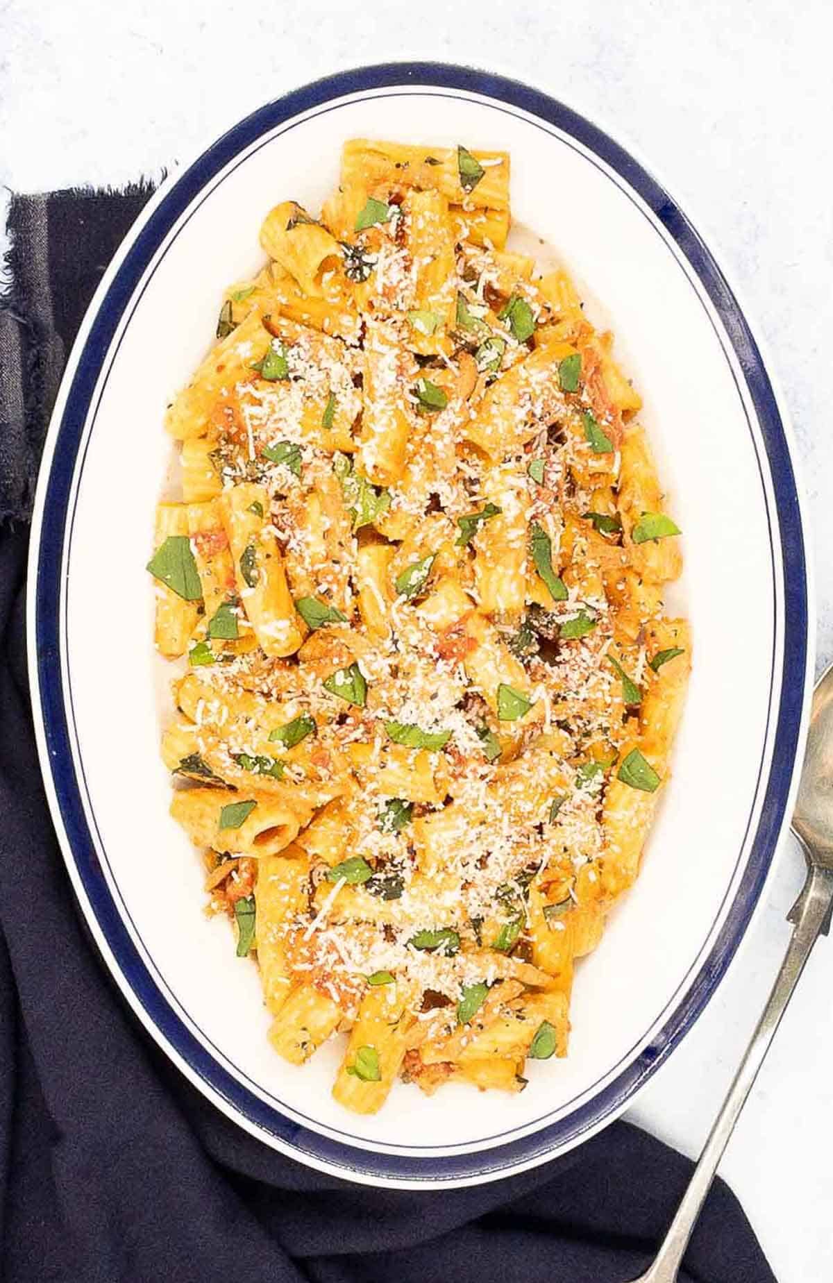 Pink sauce pasta in a large serving dish ready to eat.