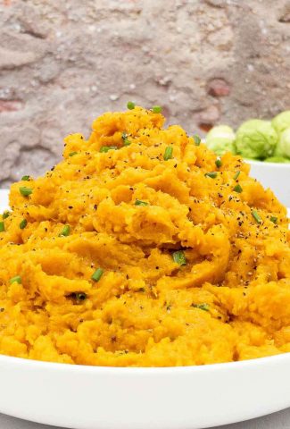 Homemade mashed sweet potatoes in a bowl.