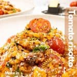 Freshly made tomato vegan risotto image for Pinterest.