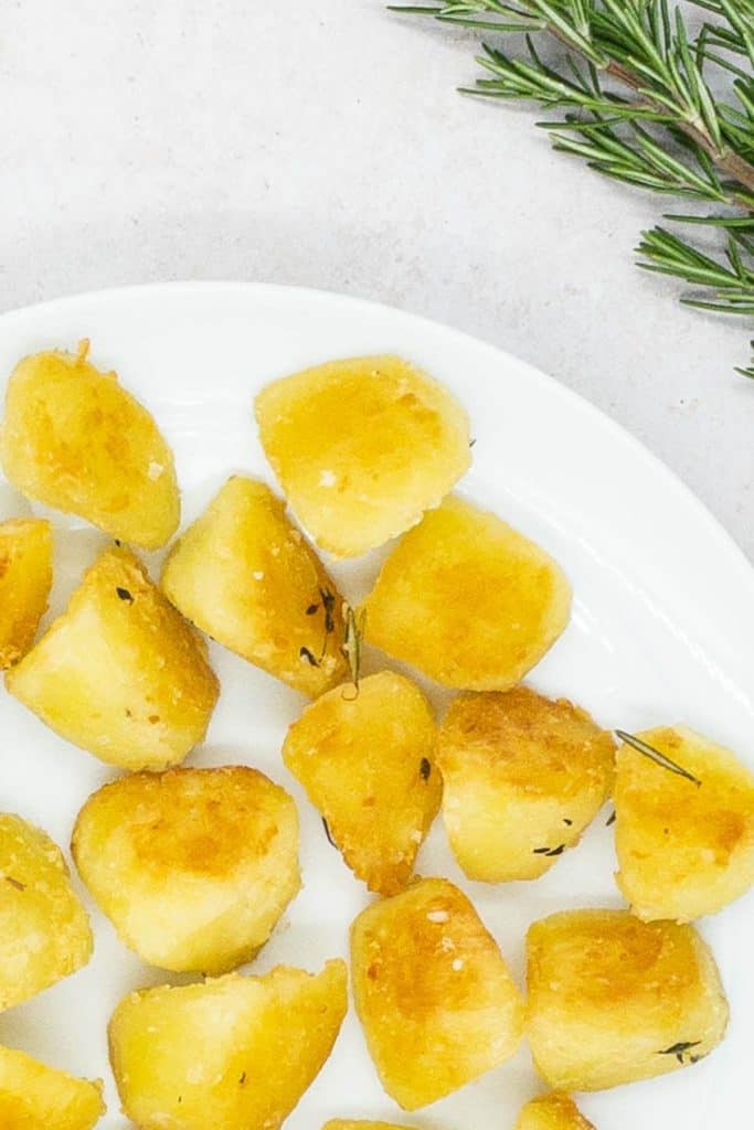 Homemade golden brown crispy oven roasted potatoes.