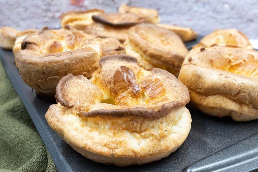 Close up of a muffin tin of delicious homemade Yorkshire puddings.