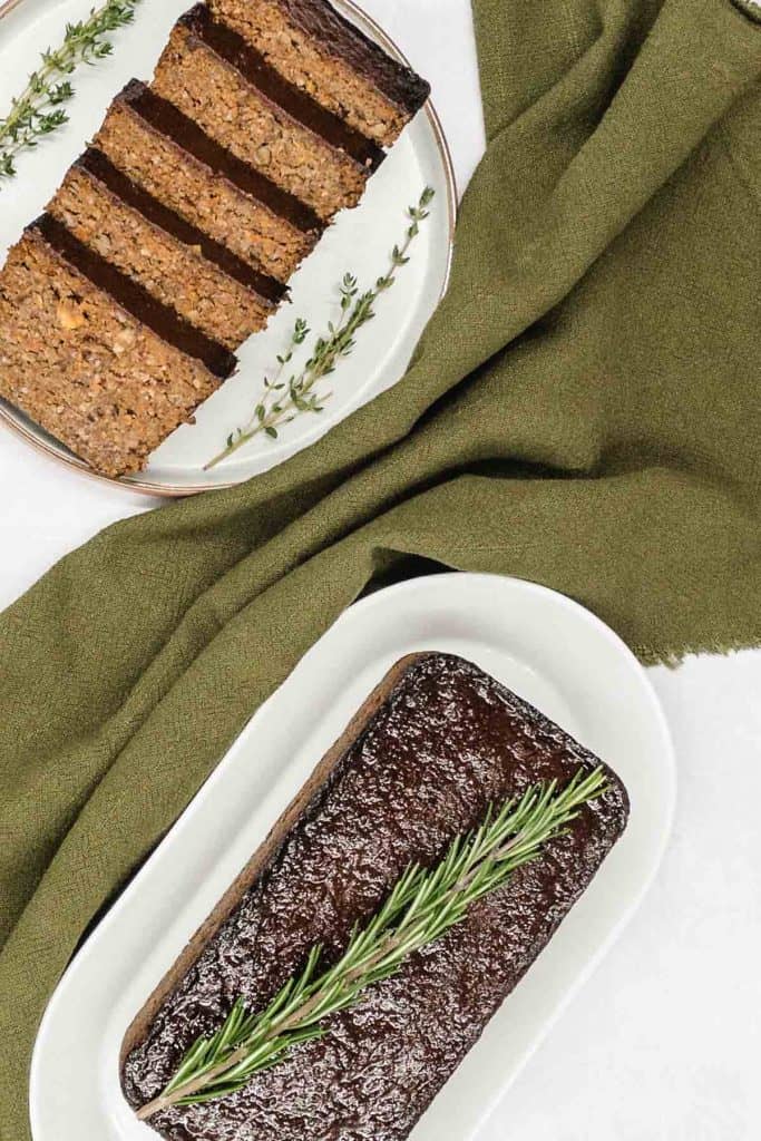 Two meatless meatloaf on dishes and ready to eat.
