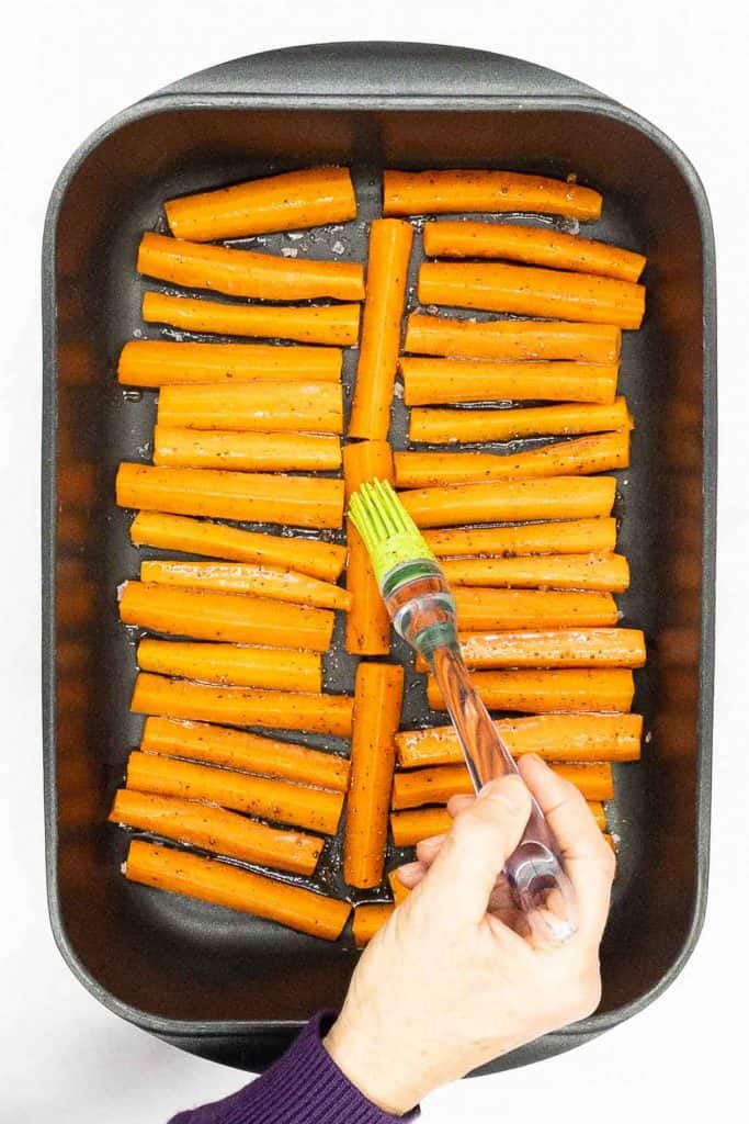 Brush carrots with honey, oil mixture.