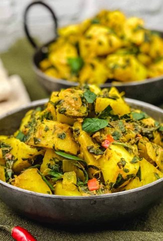 Two delicious bowls of aloo palak.