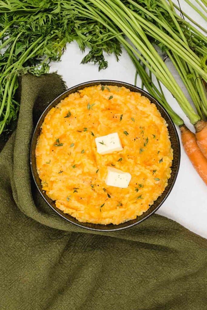 A bowl of made from scratch swede and carrot mash.