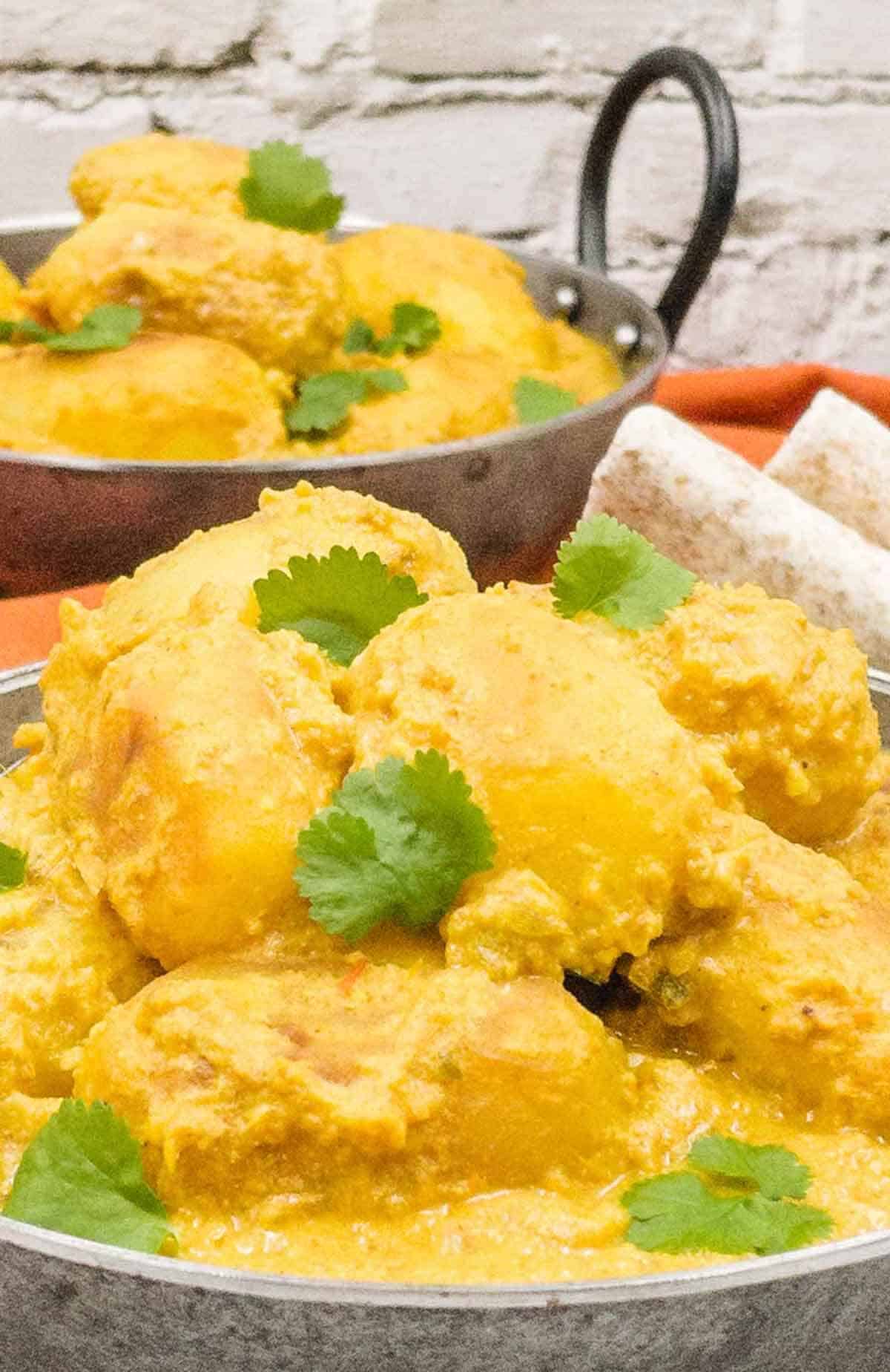 Two bowls of tasty dum aloo, spicy potato curry.