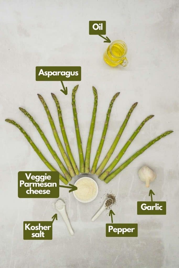 Ingredients needed asparagus, olive oil, garlic, black pepper, kosher salt, and veggie Parmesan cheese.