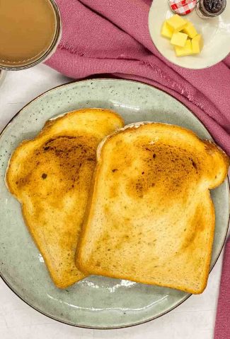 Air fryer toast on a plate.