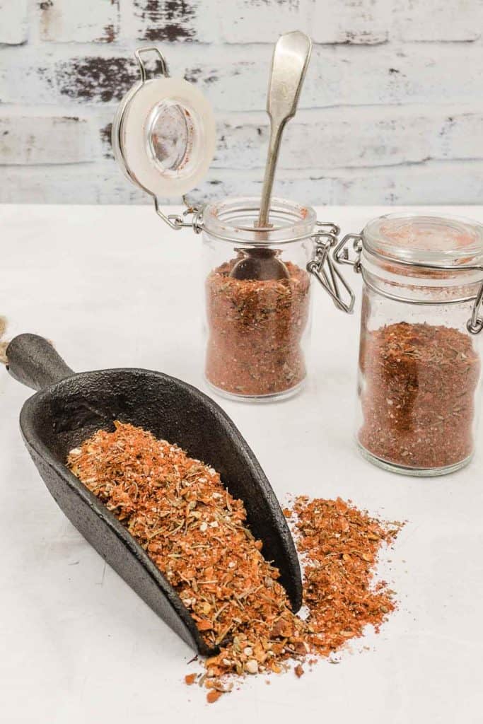 Cajun seasoning freshly made and in spice jars.