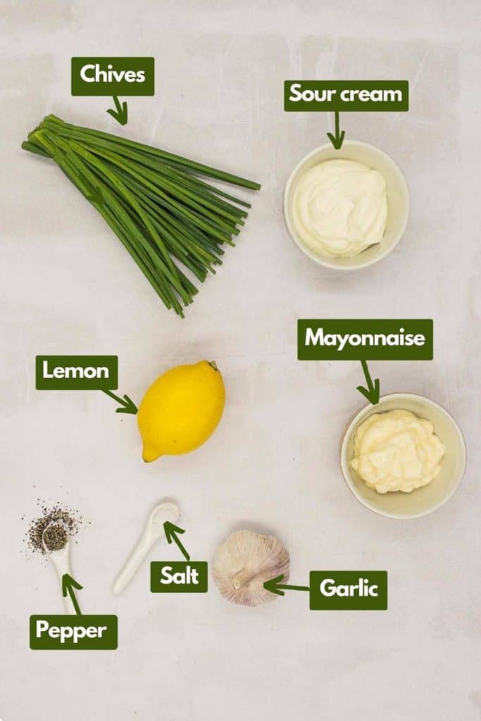 Ingredients needed, fresh chives, sour cream, mayonnaise, lemon, garlic, salt, and black pepper.