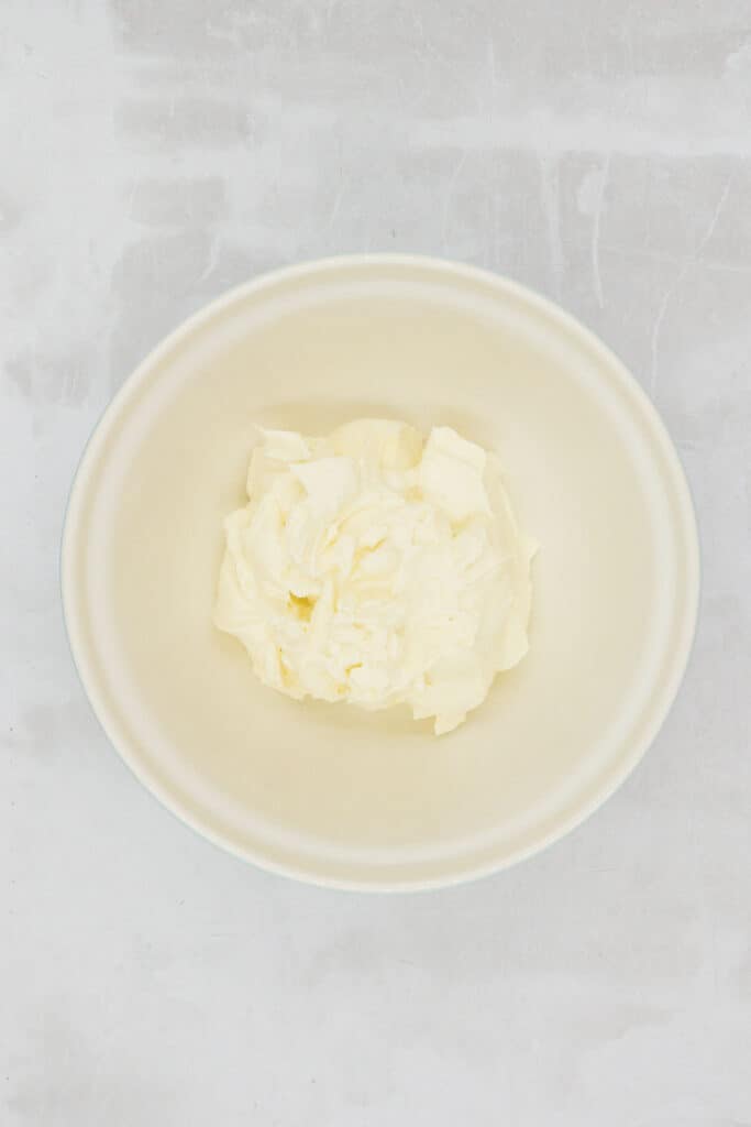 Cream cheese, vanilla paste, and sugar whisked in a mixing bowl.