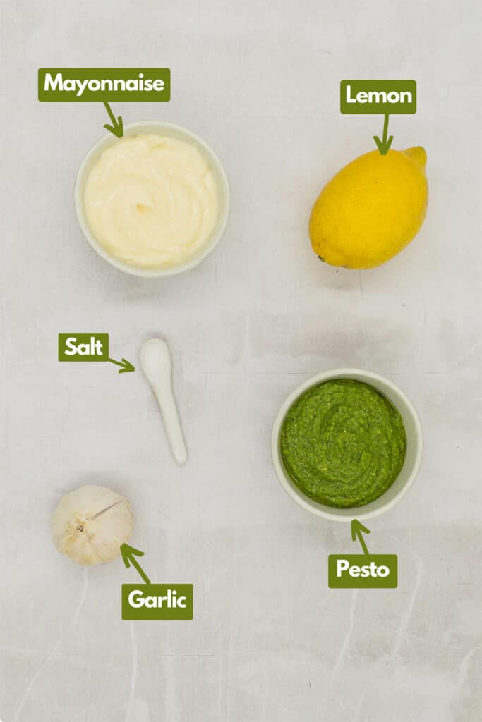Ingredients needed, mayonnaise, fresh lemon, pesto,kosher salt, and fresh garlic.