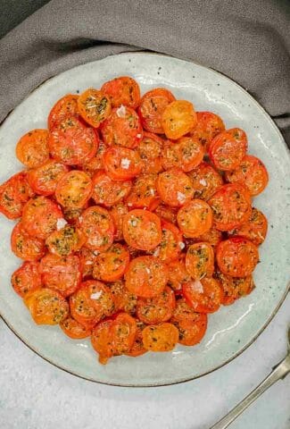 A plate of air fried cherry tomatoes.