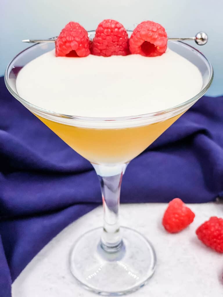 A frothy top on a French martini cocktail.