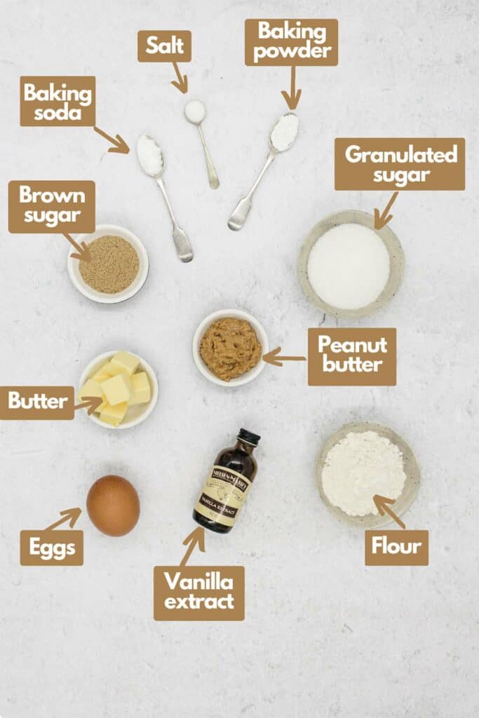 Ingredients needed, brown sugar, baking soda, salt, baking powder, granulated sugar, peanut butter, all purpose flour, vanilla extract, eggs, and butter.