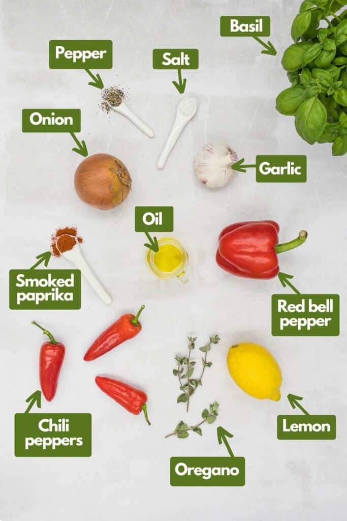 Ingredients needed pepper, salt, basil leaves, garlic, olive oil, onion, red bell pepper, lemon juice, oregano, chili peppers, and smoked paprika.