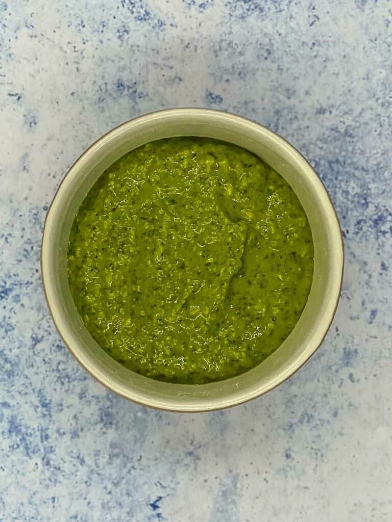 Pesto butter mixed together in a small bowl.