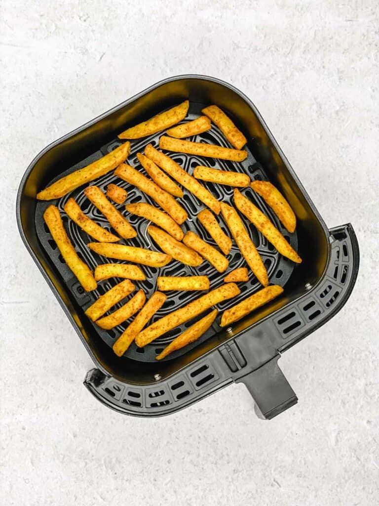 Air fried masala fries in a basket.