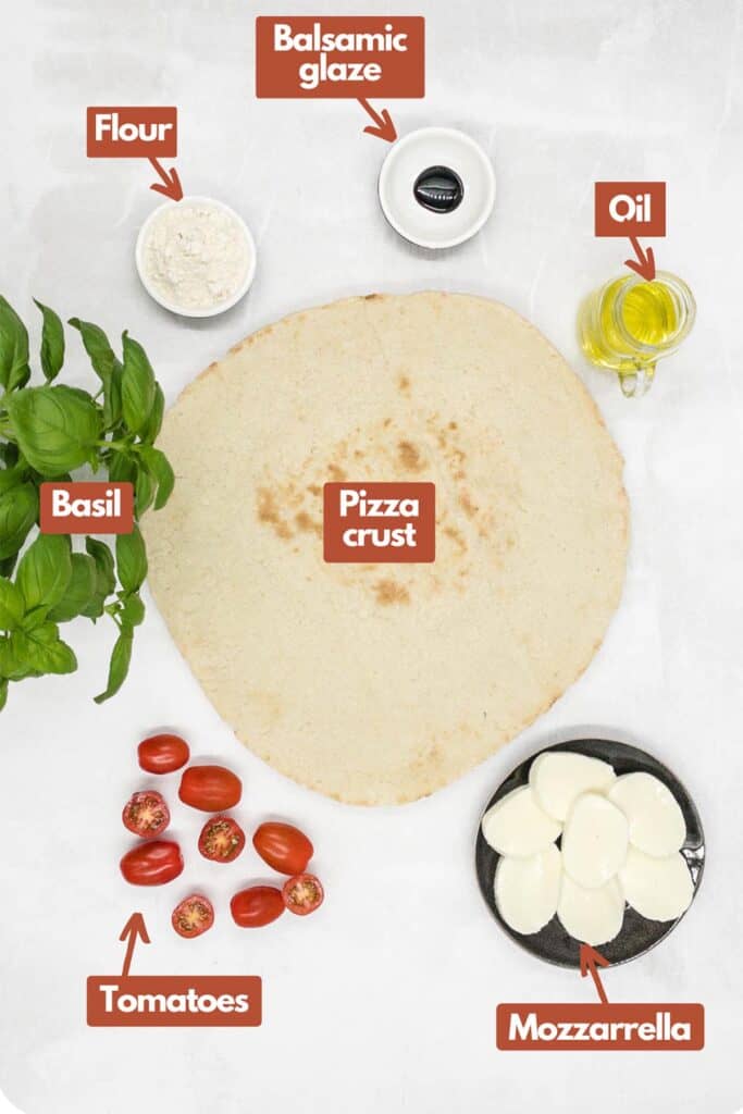 Ingredients needed, flour, balsamic glaze, olive oil, pizza crust, sliced mozzarella, and basil leaves.