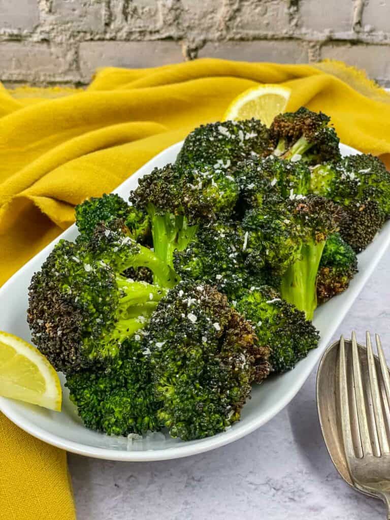 air fryer broccoli in a serving dish ready to eat. 