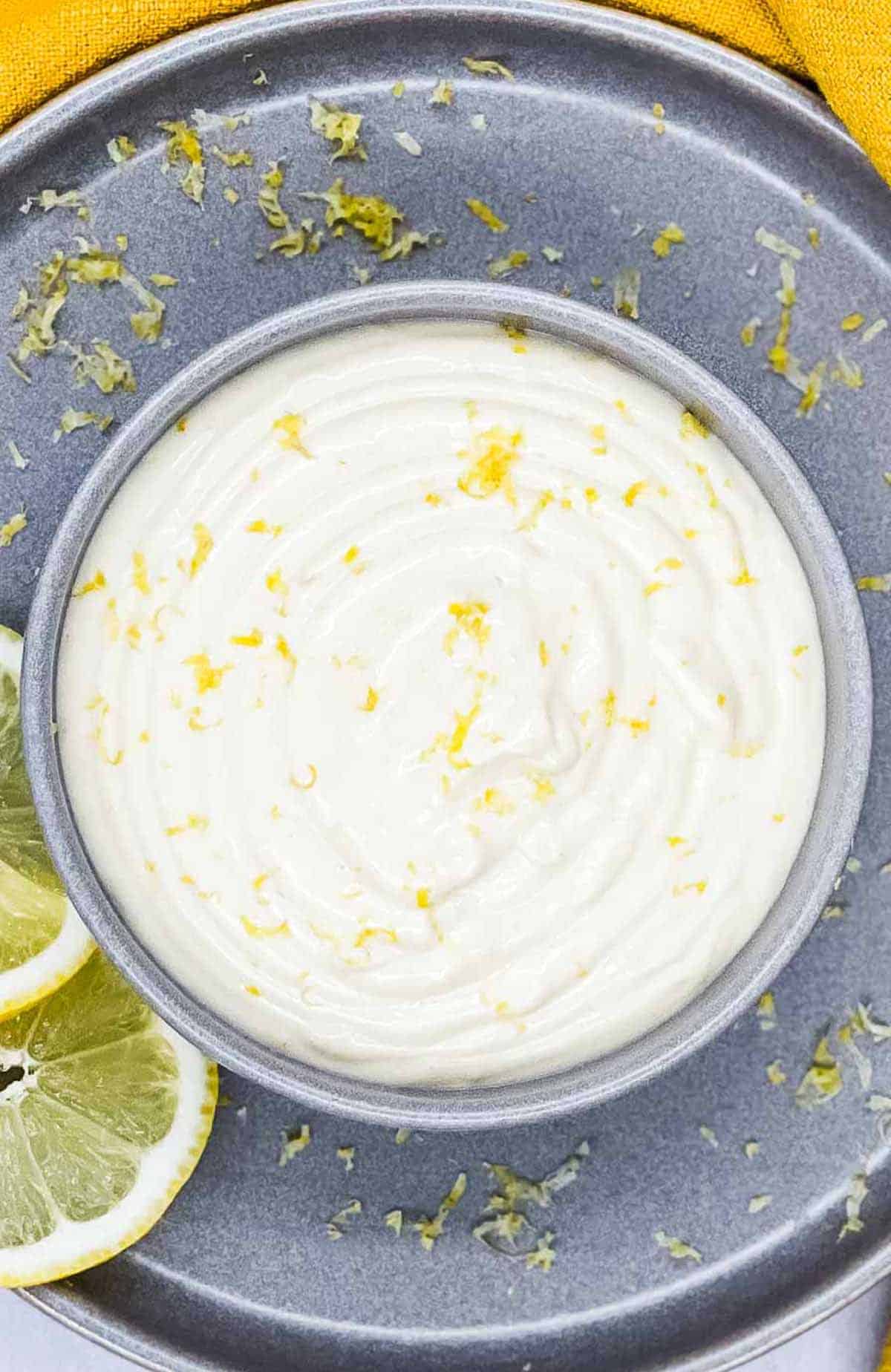 A bowl of tasty lemon ailio diping sauce.