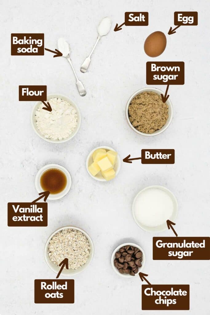 Ingredients needed, baking soda, salt, egg, brown sugar, butter, flour, vanilla extract, granulated sugar, chocolate chips, and rolled oats.