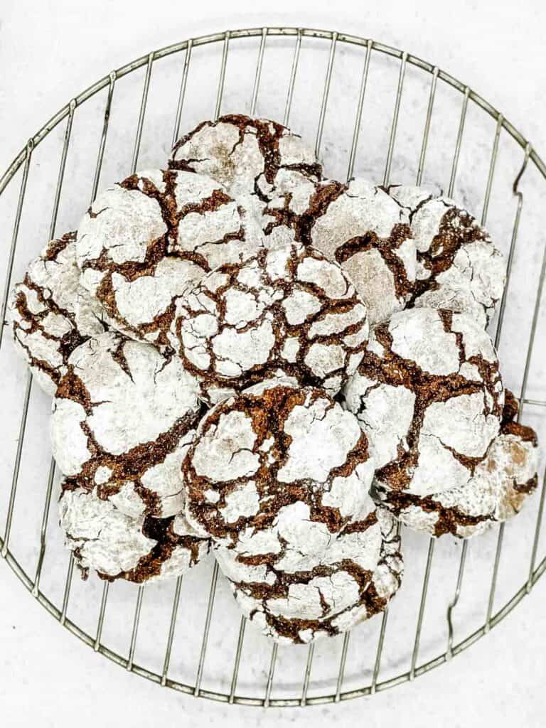 Air fried chocolate crinkle cookies on a wire rack.